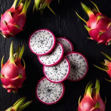 dragon fruit and sliced dragon fruit on wooden board clipart