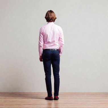 back view of young man in pink shirt standing clipart