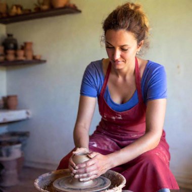 young female potter creating a pottery clipart