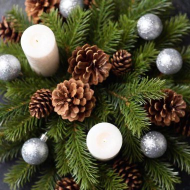 christmas decoration with candles and cones clipart