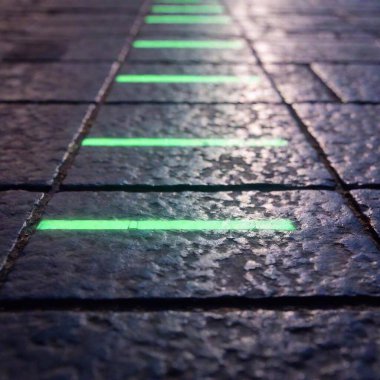 Futuristic Urban Floor: A flatlay image of a stone floor that looks to be part of a cyberpunk city, with glowing lines and symbols etched into the stones, captured in macro detail and soft focus to create depth and intrigue. clipart