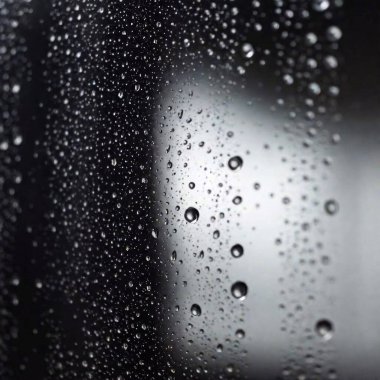 A black screen with a water droplet texture, as if raindrops are lightly falling on the surface clipart