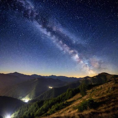 milky way over a mountain in the evening clipart