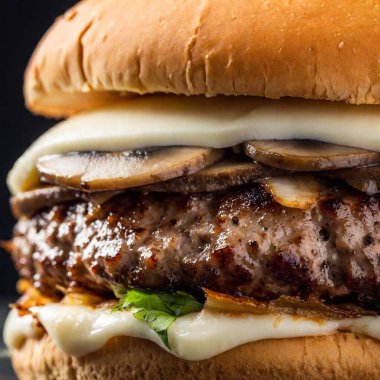 Extreme Close Up of a Hamburger with Mushrooms and Swiss Cheese: A deep focus photo capturing the earthy flavor of mushrooms and the creamy texture of Swiss cheese on a hamburger. clipart