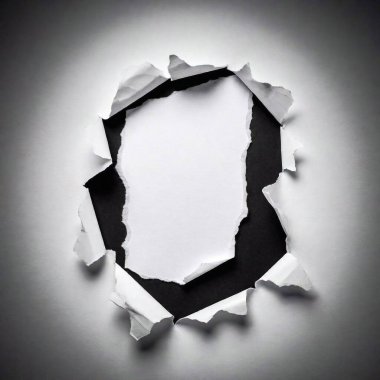 A high-resolution photograph capturing a minimalist composition featuring a piece of white paper with a jagged, horizontal tear through the center, revealing a deep black layer beneath. The torn edges are frayed, creating a textured contrast against clipart