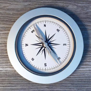 A high-resolution digital artwork of a close-up compass. The detailed compass features a sleek, modern design with a metallic silver pointer and intricate blue directional markers. The compass rests against a textured, light-wood surface, adding a clipart