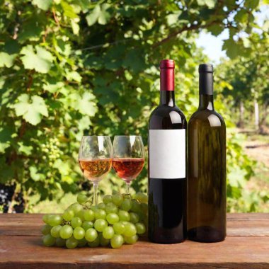 A high-resolution ultrarealistic image depicting a rustic vineyard scene captured in digital artwork. The foreground features two wine bottles, one red and one white, along with two glasses of wine filled with red and white wine, placed on a wooden clipart