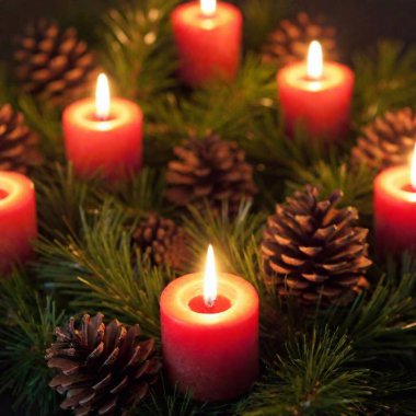 A high-resolution ultrarealistic image of a festive Christmas centerpiece. This digital photograph features a variety of red candles, with one in the center lit and casting a warm, ambient glow. Surrounding the candles are vibrant red and gold clipart