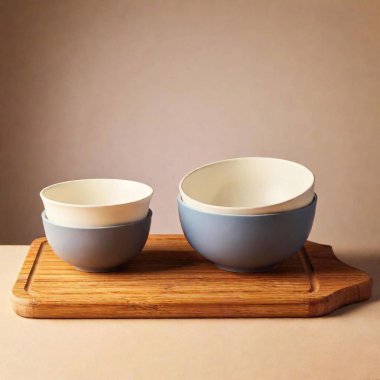 a set of matching kitchenware items, like a set of measuring cups or mixing bowls, arranged neatly in the studio. Highlight their design and how they complement each other clipart