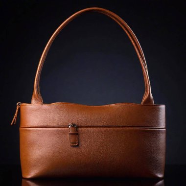 a studio shot of a high-quality leather handbag. Use soft, even lighting to highlight the texture and craftsmanship of the leather, ensuring that the bag's details and design are prominently displayed clipart