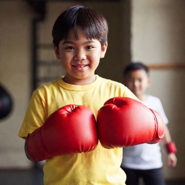 kids in boxing gloves standing in a studio. clipart