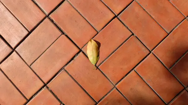 Sarı tuğla döşeme dokusu, arkaplan.