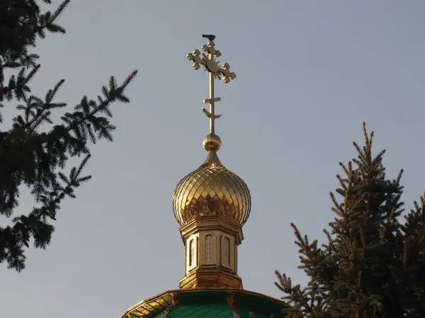 stock image Golden cross on the dome of an Orthodox church. Kharkov region.