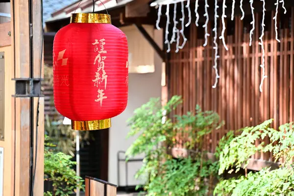 stock image Taiwan - Jan 29, 2024: Close-up of a red lantern hanging under the eaves with 
