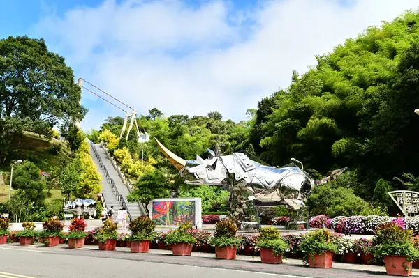 stock image Taiwan - Jul 07, 2024: Experience Taiping Cloud Ladder in Chiayi, Taiwan, featuring stunning mountain views and a unique rhino sculpture by international artist Shi Liren.