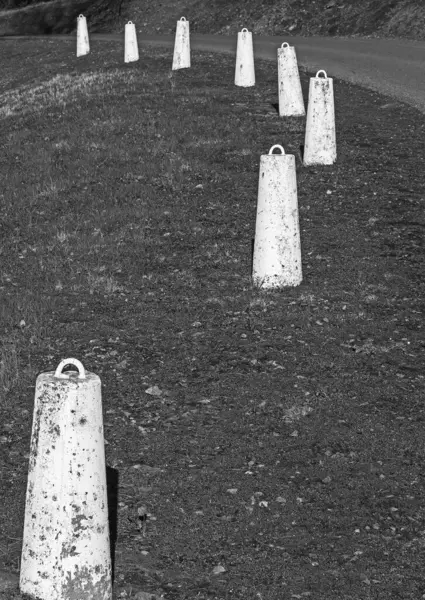 stock image Concrete road barrier in black and white, Folsom Lake Park road
