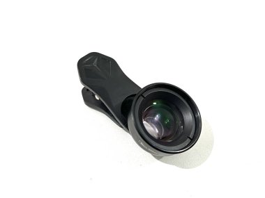 External 100 mm macro lens for mobile phone camera attachment isolated on white background clipart