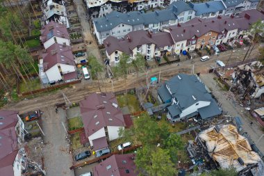 Hostomel, Kyev region Ukraine - 09.04.2022: Top view of the destroyed and burnt houses. Houses were destroyed by rockets or mines from Russian soldiers. Cities of Ukraine after the Russian occupation.