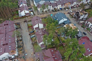 Hostomel, Kyev region Ukraine - 09.04.2022: Top view of the destroyed and burnt houses. Houses were destroyed by rockets or mines from Russian soldiers. Cities of Ukraine after the Russian occupation.