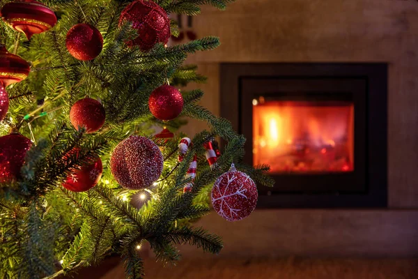 Christmas Tree Decoration Lights Close View Burning Fireplace Background Winter — Stock Photo, Image