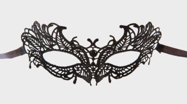 Carnival Venetian female mask black color lace isolated on white background