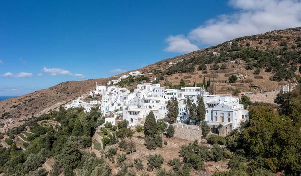 stock image Cyclades, Greece. Tinos Greek island, aerial drone view of Kardiani village town, white color buildings, cloudy blue sky