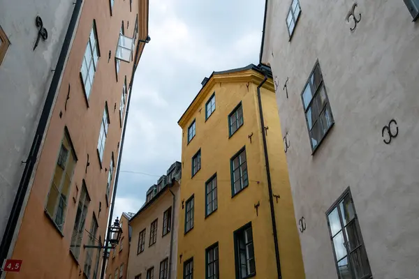 Sweden, traditional vintage building in Stockholm, holiday at Gamla Stan. Upper part of apartment for rent at Old Town, travel destination. Under view
