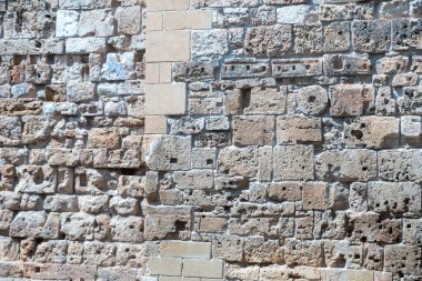 Remains of fortification stone wall background. Byzantine Wall fortress at Chania, Crete island, Greece. Acropolis of Kydonia defensive stonewall. clipart