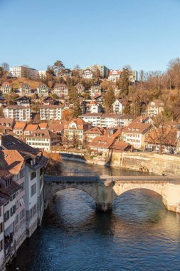 Bern, Switzerland. City View. The Untertor Bridge, Aare River and the historic Nydegg Church clipart