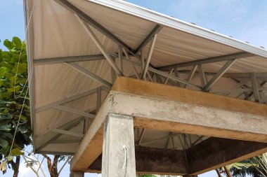 light weight steel truss, fabricate frame steel truss structure at Gazebo roof, on top of concrete beam (ring balk) clipart