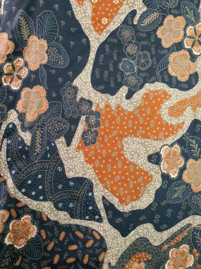 Çiçekli ve soyut desenli Batik. Batik Endonezya 'dan güzel bir sanat eseridir. Geleneksel Batik 'teki desenler, görsel ve felsefi güzelliği temsil ediyor.