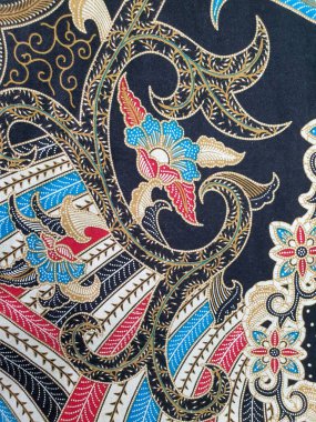 Soyut desenli, karışık renklerde Batik. Batik Endonezya 'dan güzel bir sanat eseridir. Geleneksel Batik 'teki desenler, görsel ve felsefi güzelliği temsil ediyor.