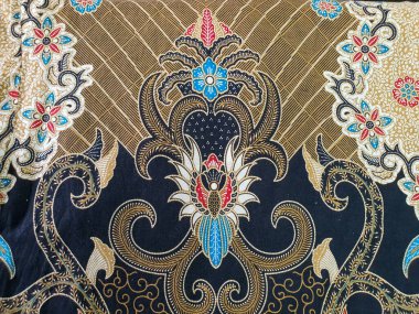 Soyut desenli, karışık renklerde Batik. Batik Endonezya 'dan güzel bir sanat eseridir. Geleneksel Batik 'teki desenler, görsel ve felsefi güzelliği temsil ediyor.