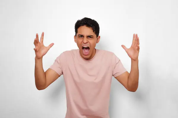 stock image angry young man on white background