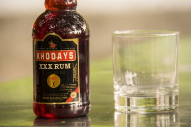 A Khoday's rum bottle, one of the most popular brand from Indian subcontinent among all age groups clipart