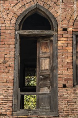 An old window in the park outside Jallianwala Bagh in Amritsar, Punjab clipart