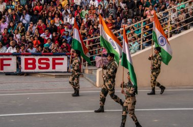 A view of India BSF personnel celebrating in the border of Attari-wagah border on the outskirts of Amritsar, Inda clipart