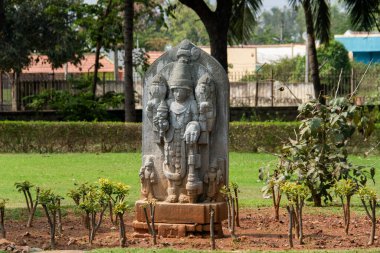 A nice sculpture on display in the gradens inside temple complex of Somanathapura clipart