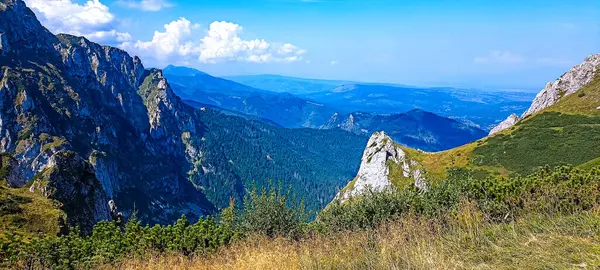 Stock image Journey to the mountains. Hiking in the Tatra Mountains. Mountain peaks with valleys between them. Active lifestyle. 