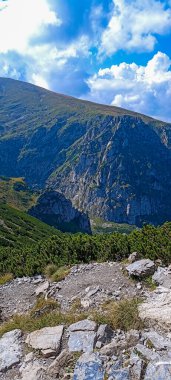 Journey to the mountains. Hiking in the Tatra Mountains. Mountain peaks with valleys between them. Active lifestyle. clipart