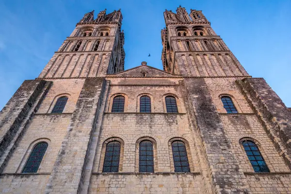 stock image The historic Men's Abbey in Caen showcases Gothic spires against a serene sky.