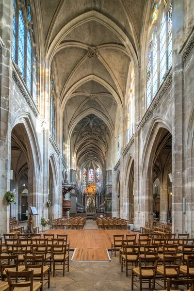 stock image Sunlight streams into Saint Merris church, illuminating its Gothic architecture.