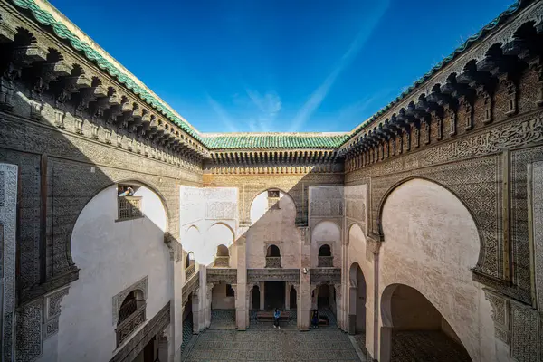 stock image A tranquil view captures the essence of Fez through the ornate window of Cherratine Madrasa. Fez, Morocco.