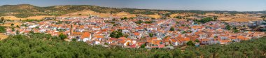 Panoramic view of Alanis de la Sierra, Sevilla, Spain from the castle, showcasing the town's beautiful landscape and charming architecture. clipart