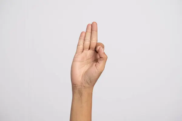 Deaf alphabet letter F by hand. Letter \'F\' in sign language, isolated on a white background. Hand gestures. hearing impairment. languages that use visual manual modality. deaf signs.