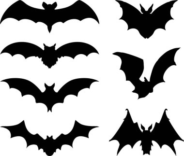 Beyaz arka planda uçan yarasaların siluetleri
