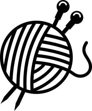 Çizgili iplik topu örgü iğneleriyle dinleniyor.