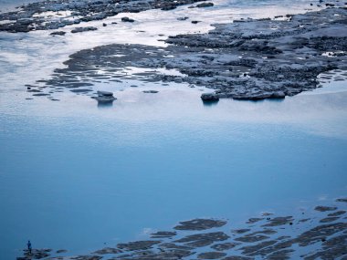 Yangtze river shoal visible in Chognqing city, China, during the low water level season clipart