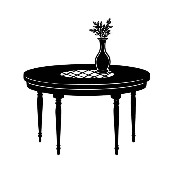 Çiçek vazosu olan masa.