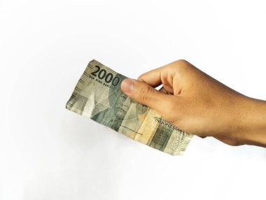 Beyaz bir zemin üzerinde izole edilmiş bir Endonezya rupiası, Endonezya para biriminin adıdır..